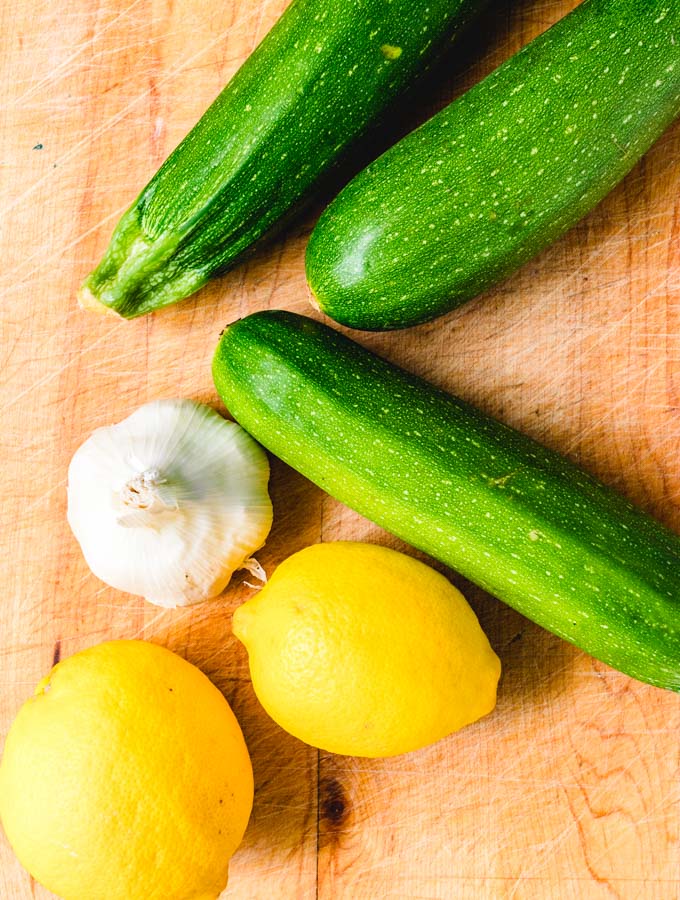 Ingredients: zucchini, lemons, and garlic.