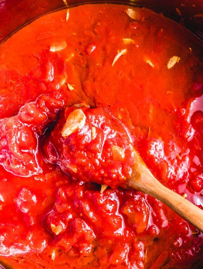 Clams In Red Sauce - sipandfeast.com #seafoodrecipe #dinner #italianfood #clams The red sauce with lots of garlic.
