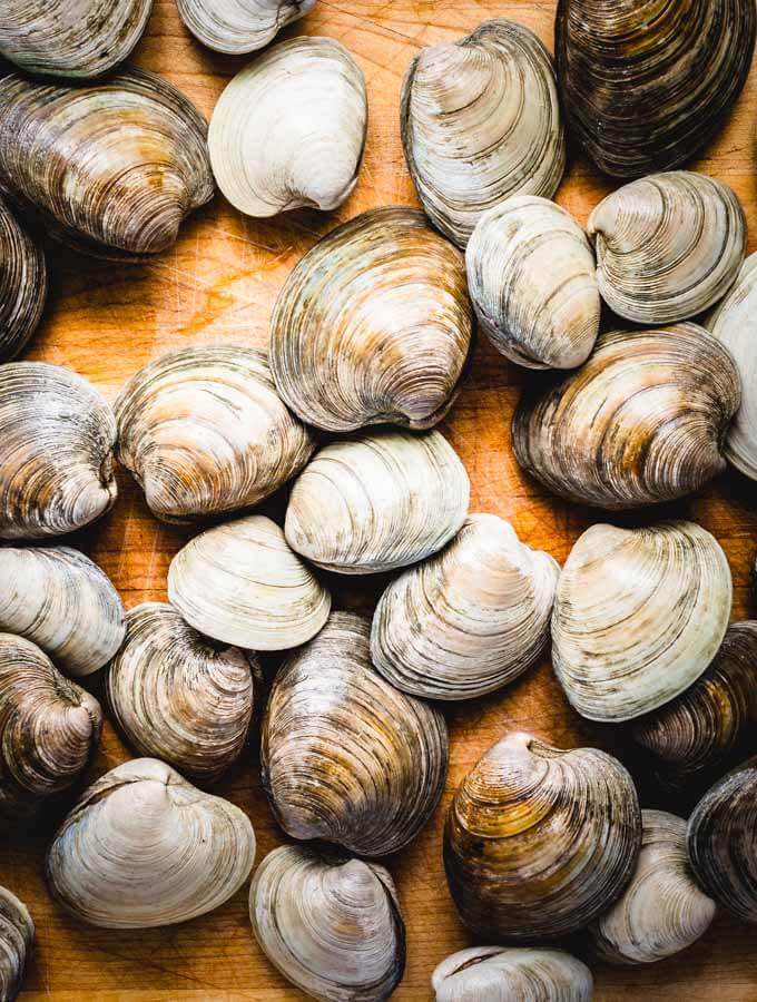 Clams In Red Sauce - sipandfeast.com #seafoodrecipe #dinner #italianfood #clams 2 pounds of Littleneck Clams.