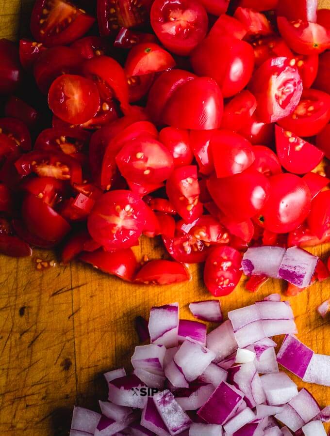 Chopped tomatoes and red onions.