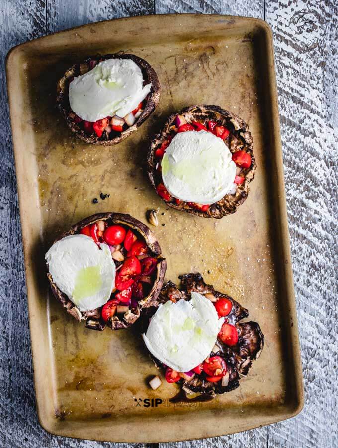 Portobellos topped with fresh mozzarella.