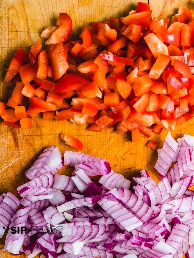 Chorizo and egg ingredients of diced pepper and onions.