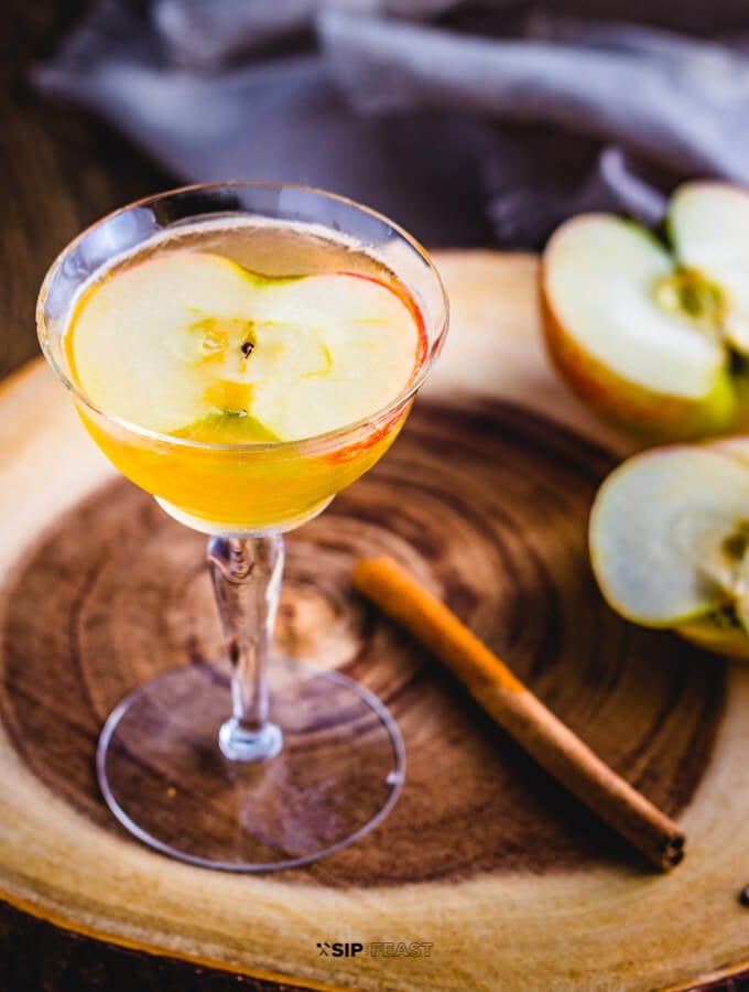 Apple cider cocktail with maple syrup and bourbon featured image.