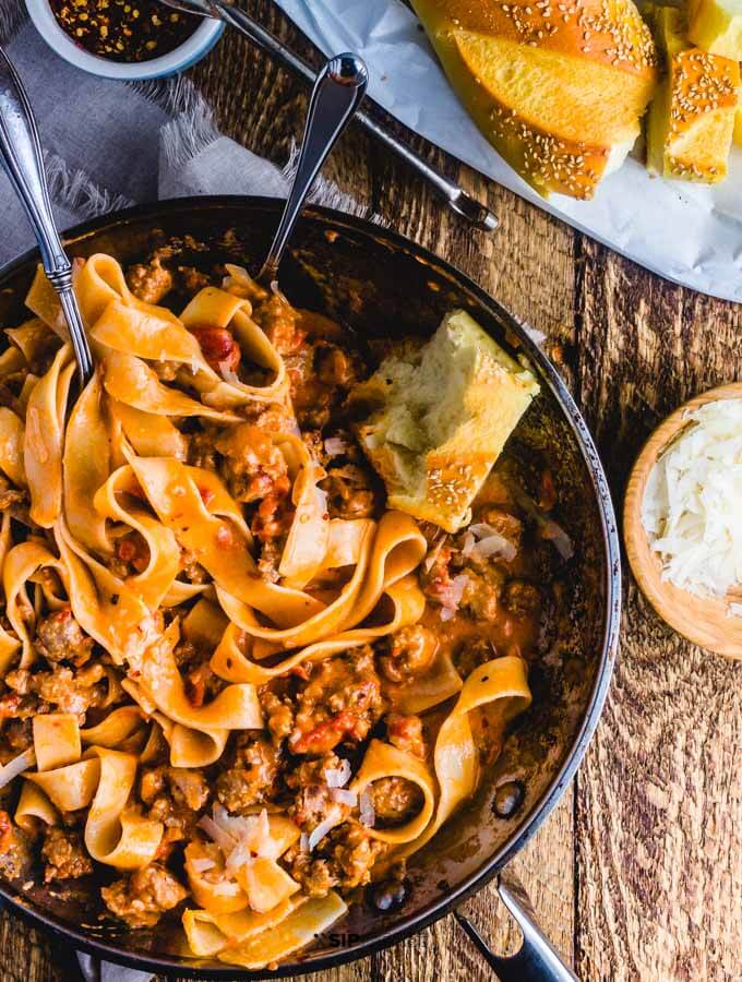 Italian Sausage Pasta In An Easy Cream Sauce - Sip and Feast