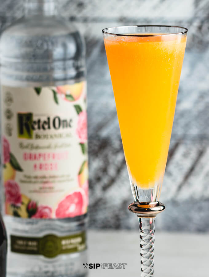 Peach bellini in flute glass.