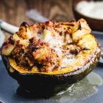 Sausage and apple stuffed acorn squash featured image.