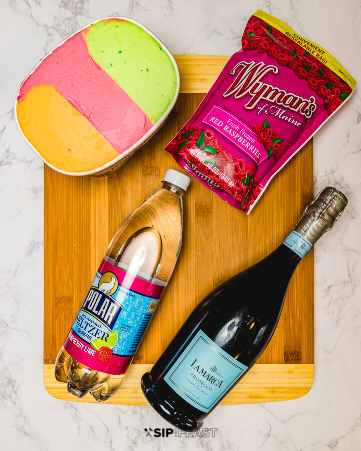 Ingredients: rainbow sherbet, frozen raspberries, seltzer and prosecco.