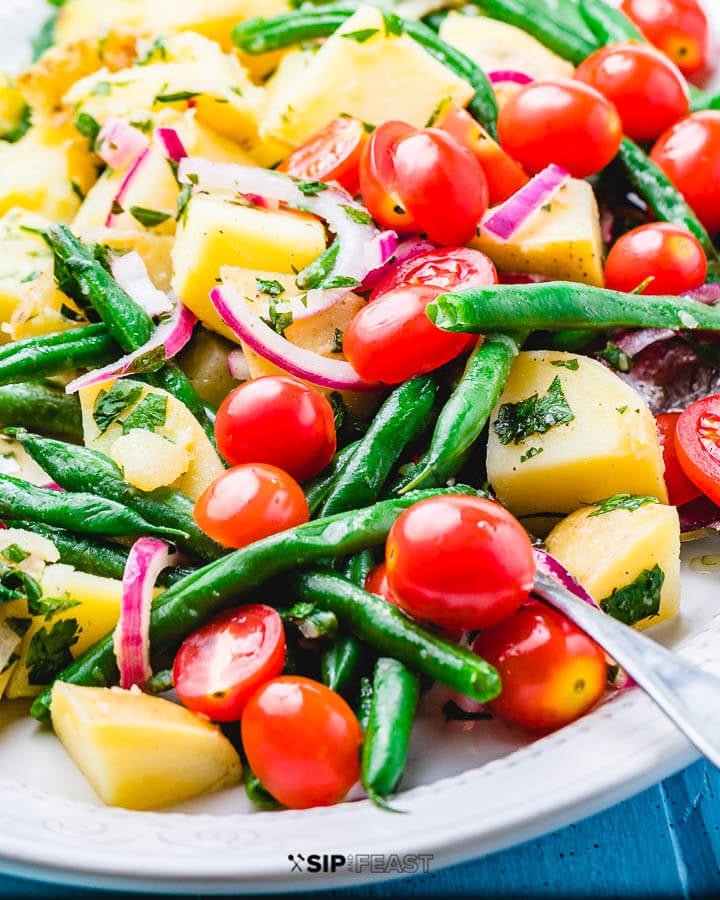 Close up shot of the salad on blue table.