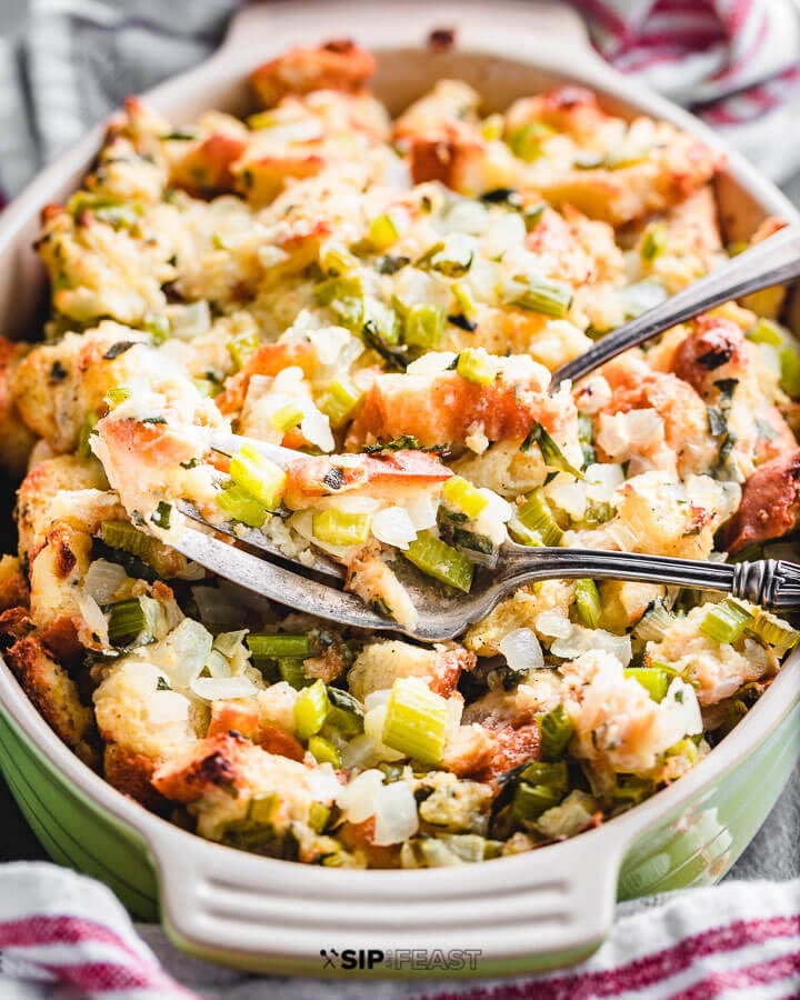 Green baking dish with cooked stuffing.