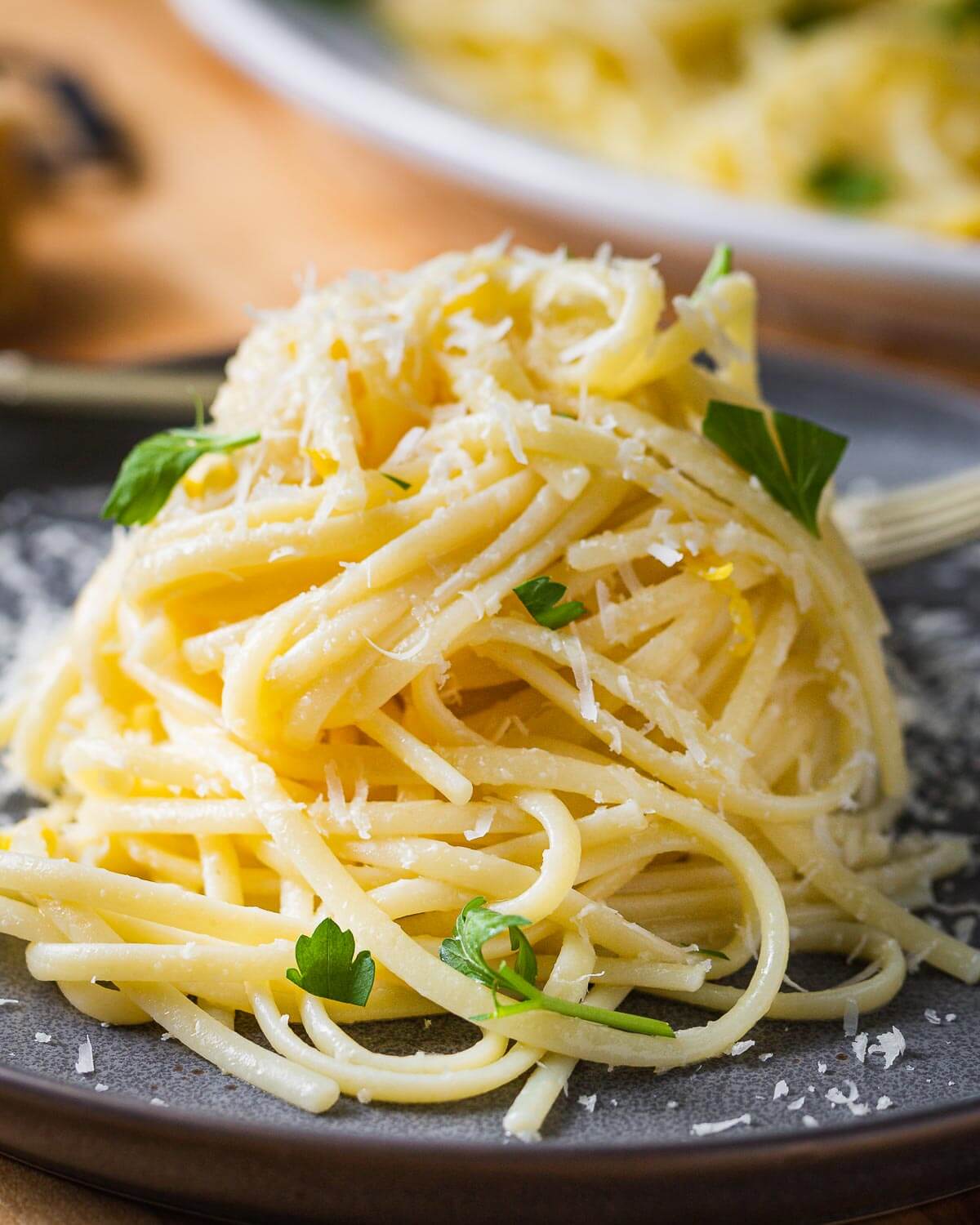 Close up shot of linguine al limone in plate.