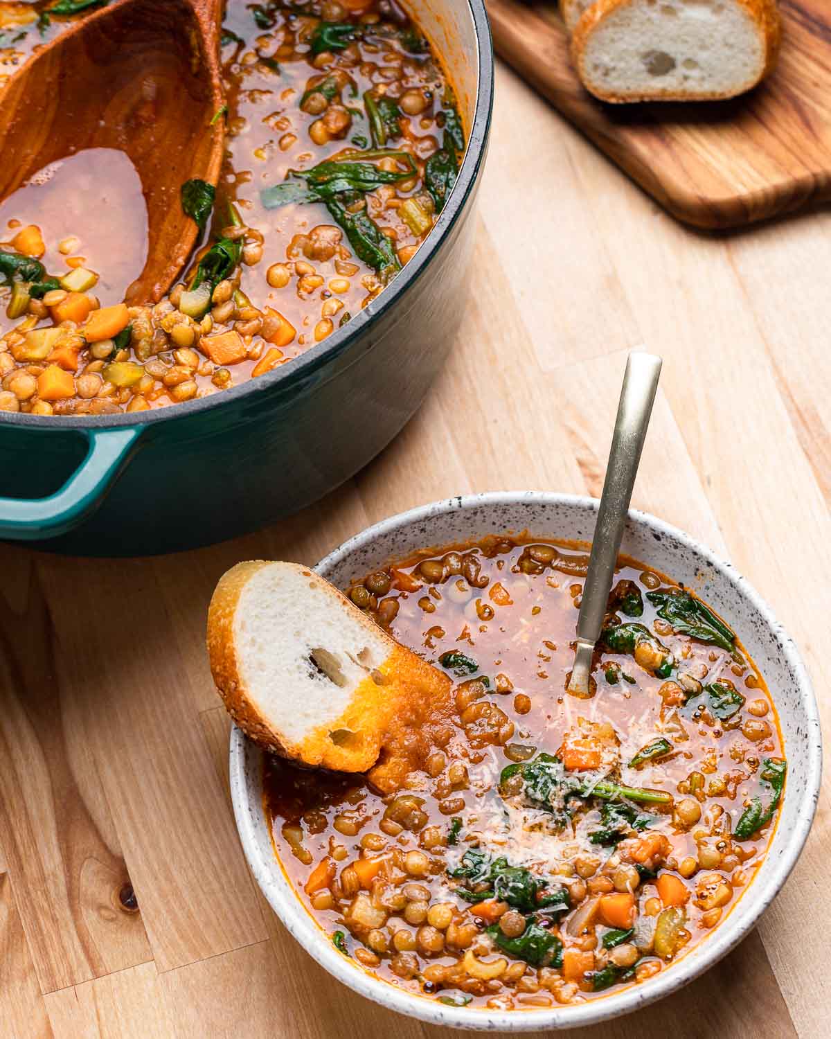 Pot and bowl of lentil soup.
