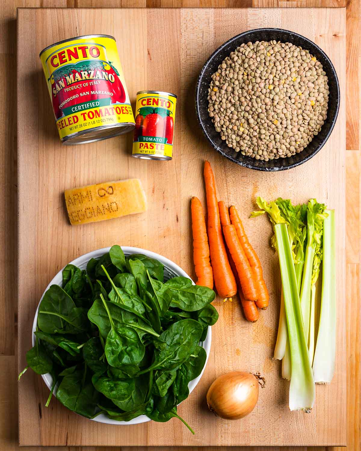 Ingredients shown: plum tomatoes, tomato paste, lentils, Parmigiano Reggiano rind, spinach, carrots, onion, and celery.