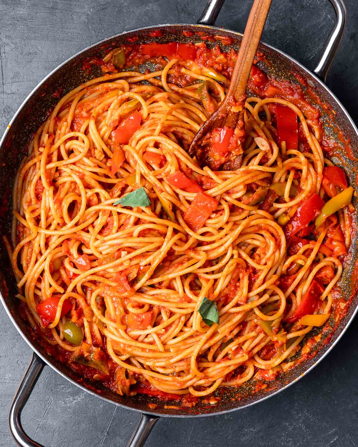 Large pan with cooked spicy pepper bucatini.