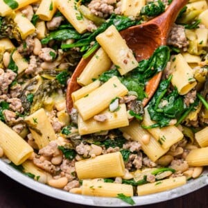 Beans and greens sausage pasta featured image.
