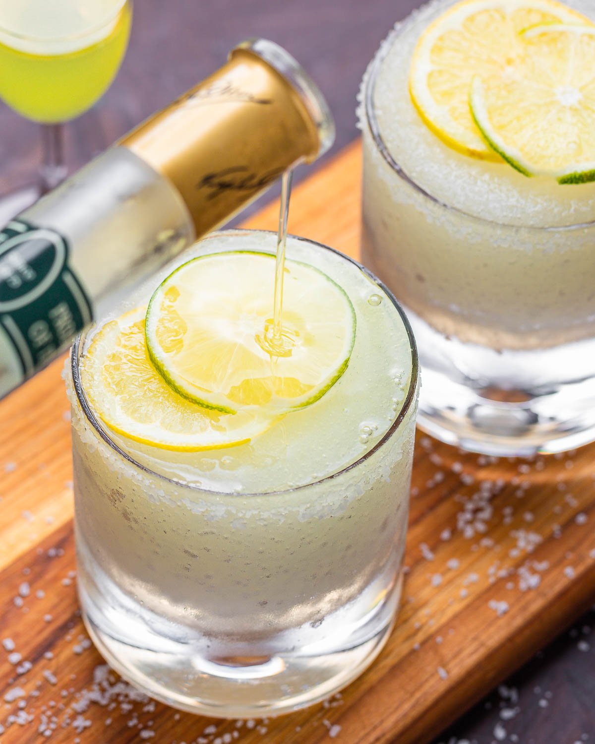 Pouring a limoncello floater on top of the limoncello margarita.