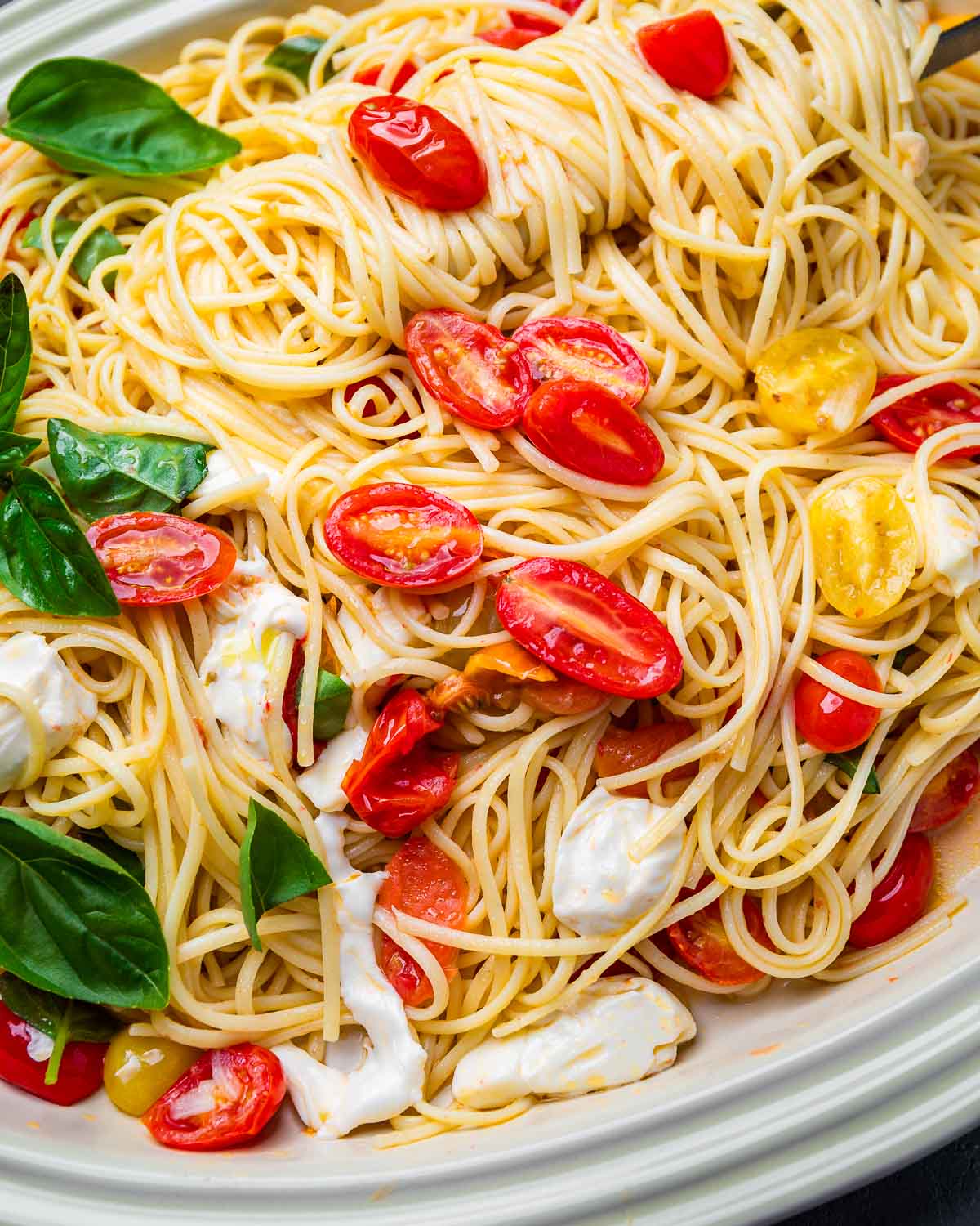 Caprese pasta in large platter.