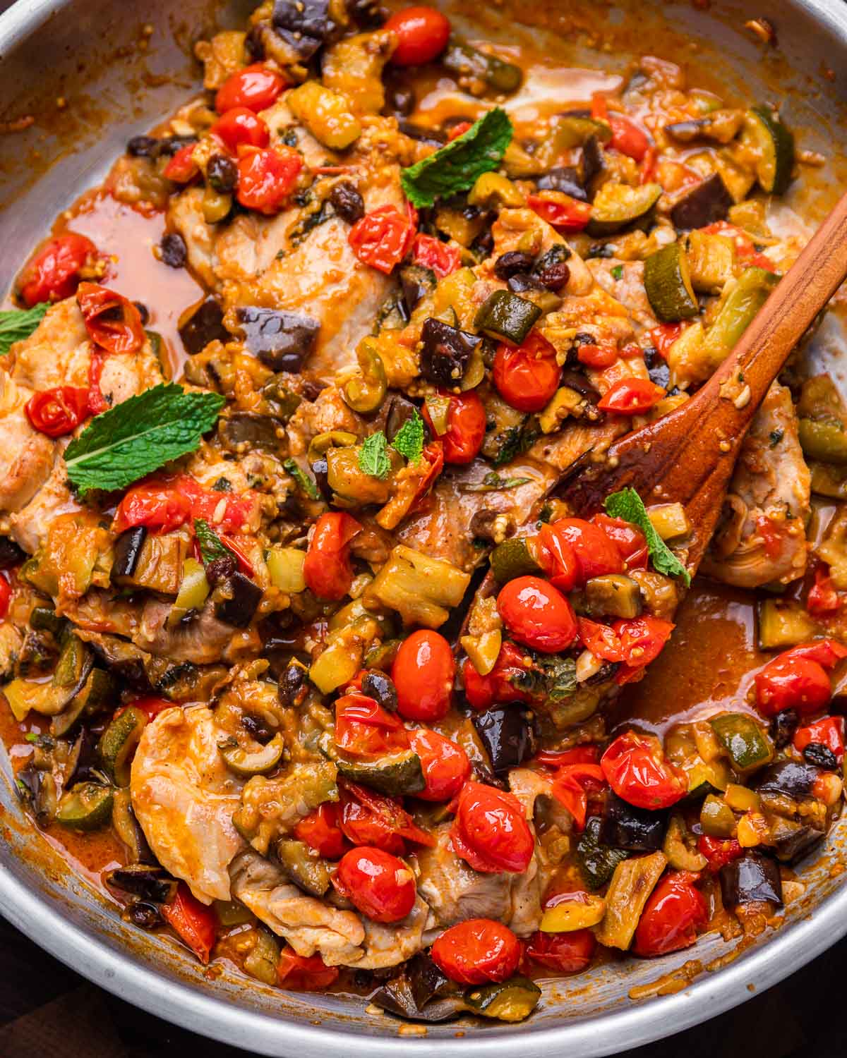 Chicken agrodolce in large pan.
