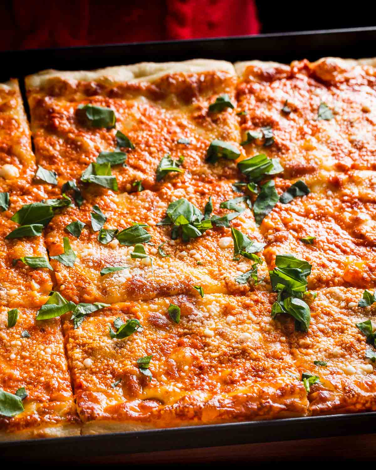 Vodka sauce Grandma pizza in pan.