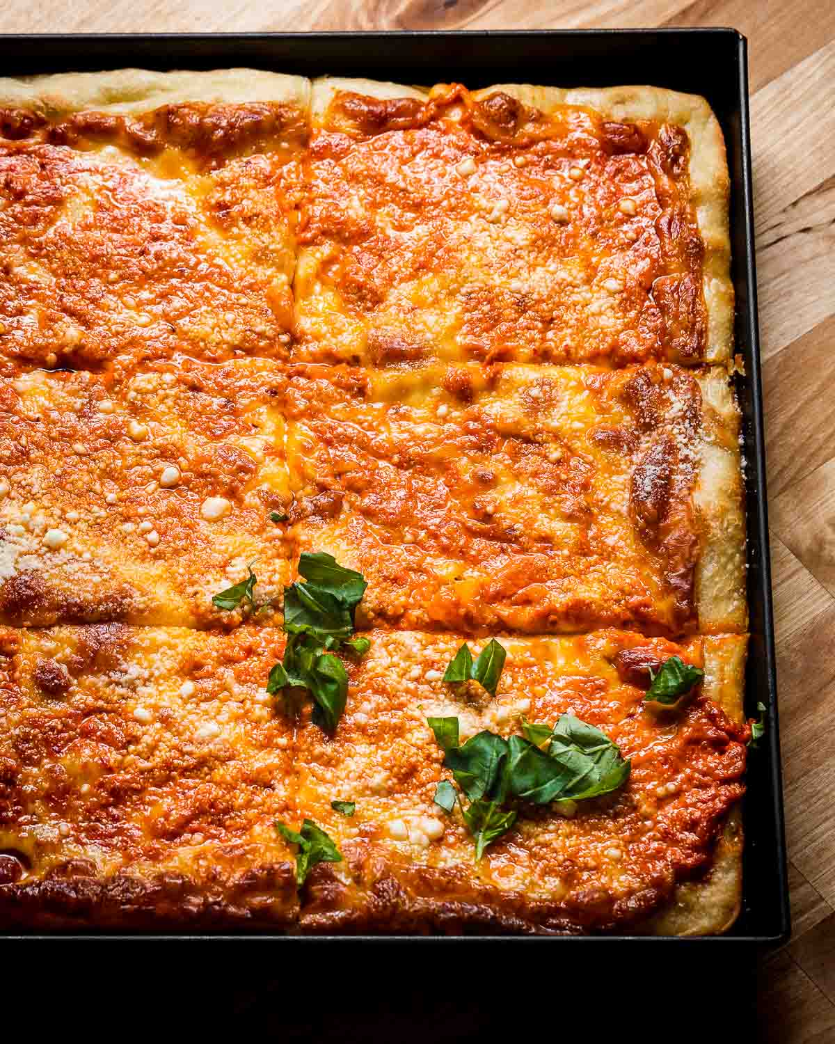 Vodka sauce Grandma pizza in pan.