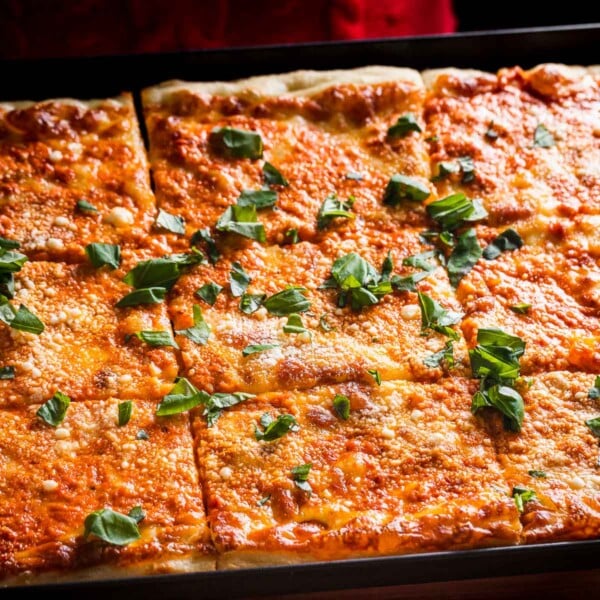 https://www.sipandfeast.com/wp-content/uploads/2022/07/vodka-sauce-grandma-pizza-recipe-snippet-600x600.jpg