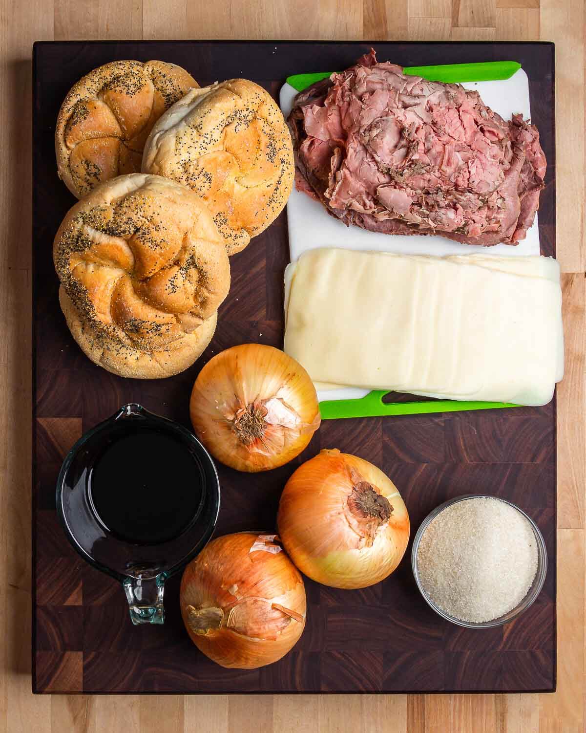 Ingredients shown: 4 hard rolls, roast beef, mozzarella, onions, balsamic vinegar, and sugar.