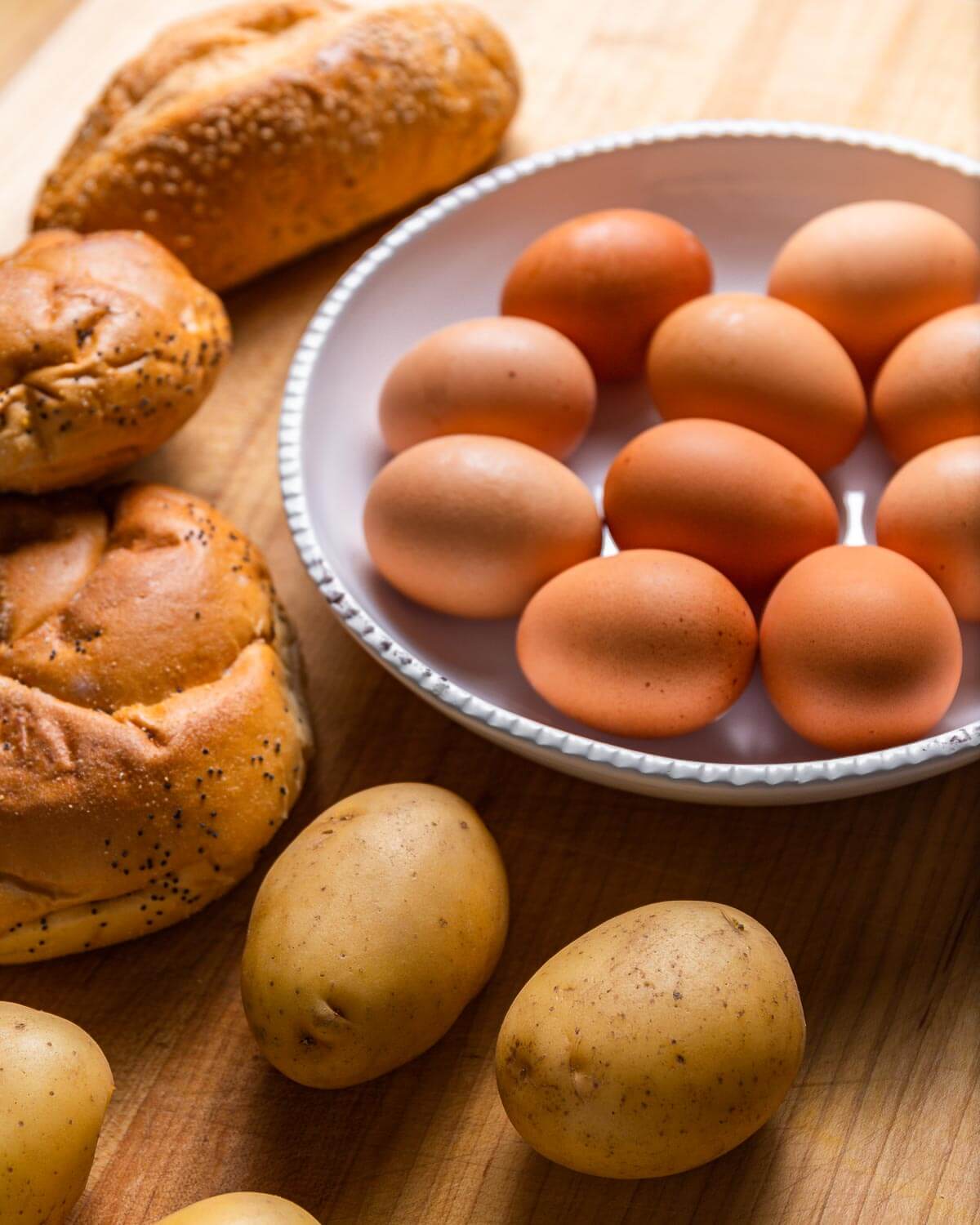 Ingredients shown: rolls and hero bread, egg, and potatoes.