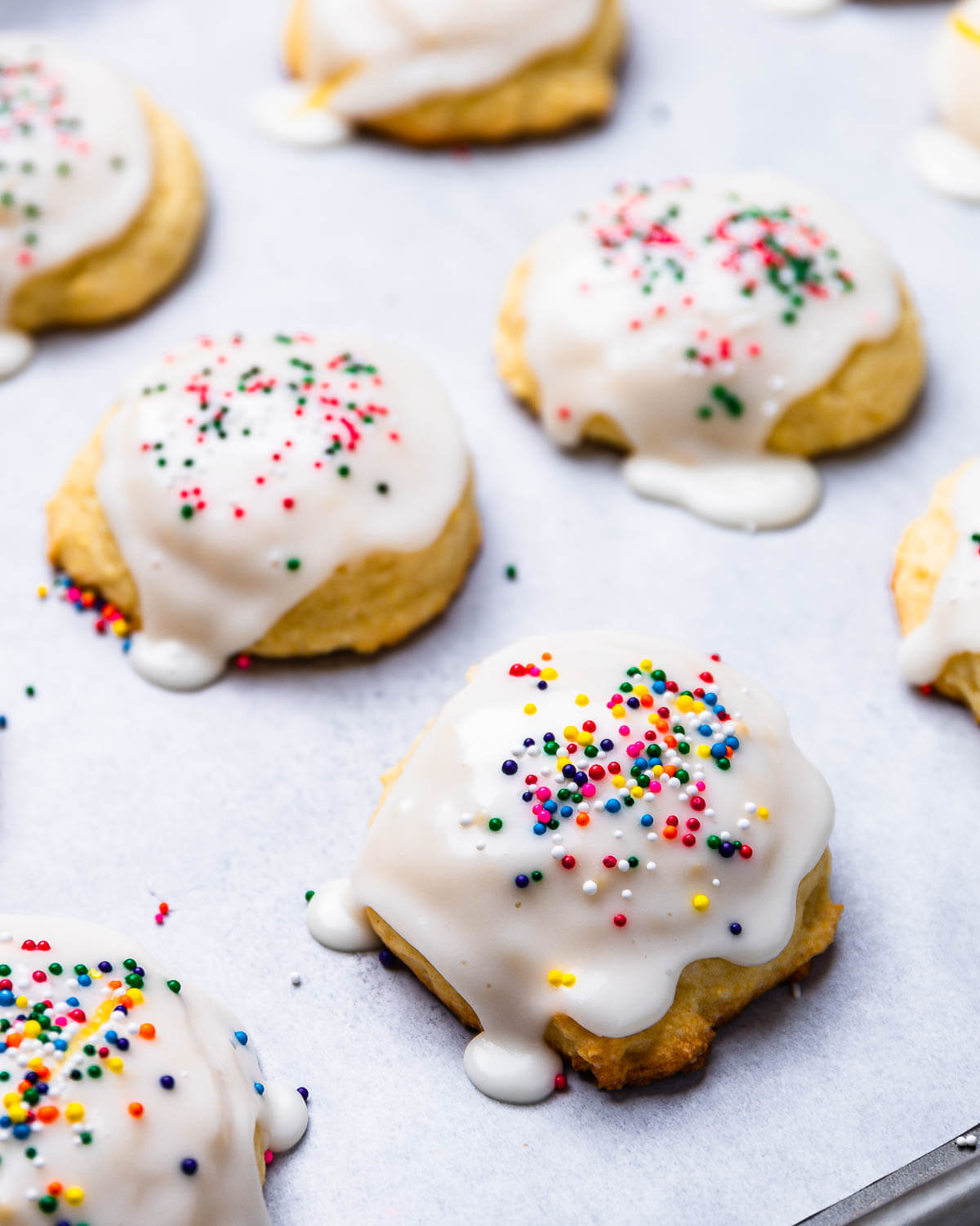 Baking sheet with baked lemon ricotta cookies.