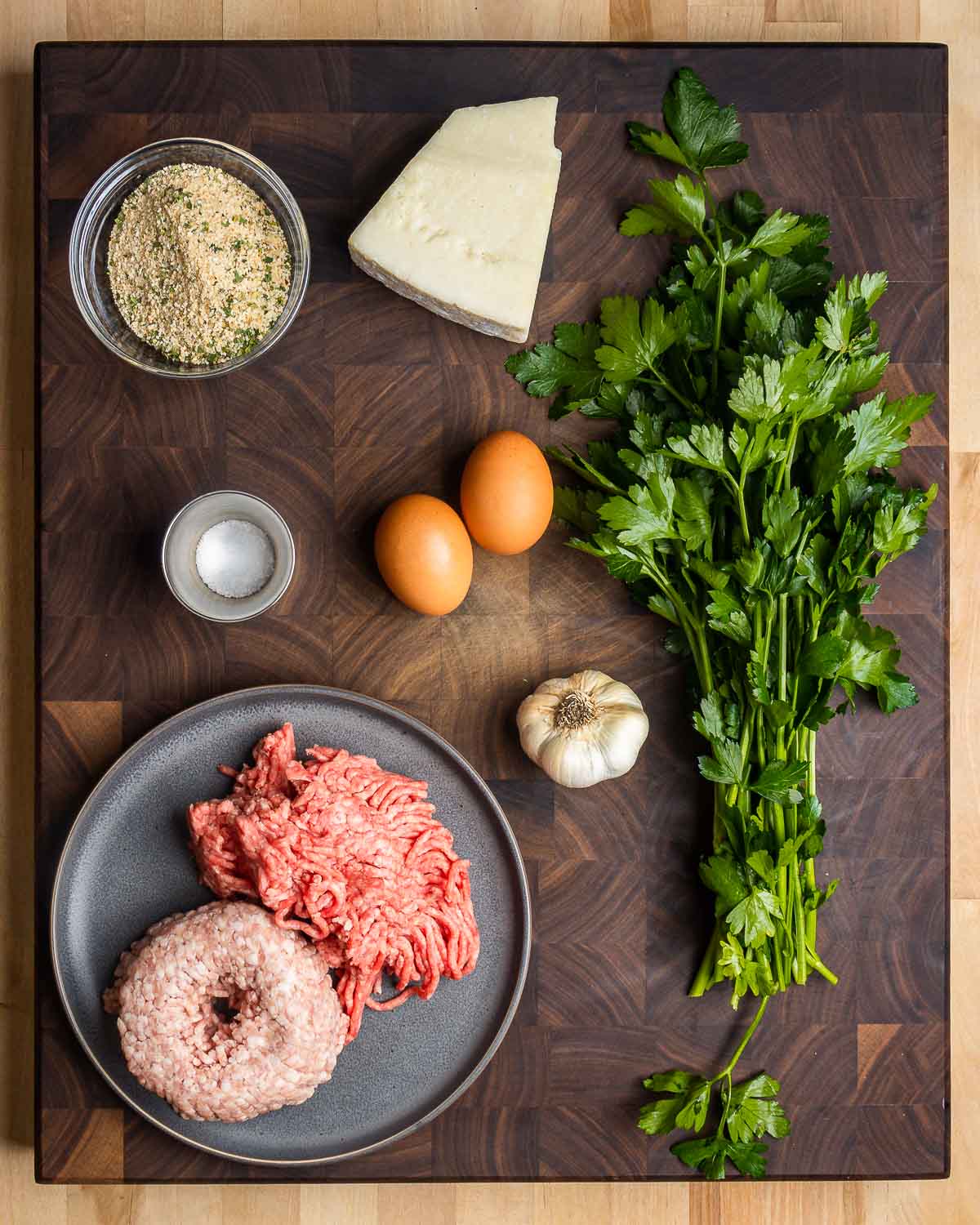 Tiny meatball ingredients shown: breadcrumbs, Pecorino, parsley, salt, eggs, garlic, ground chuck, and ground pork.