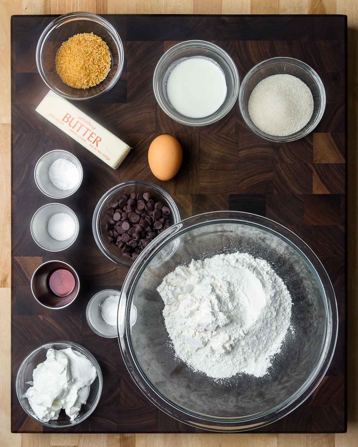 Ingredients shown: turbinado sugar, heavy cream, sugar, butter, 1 egg, baking powder and soda, chocolate chips, vanilla, salt, flour, and sour cream.