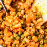 Pasta and peas in red sauce Pinterest image.