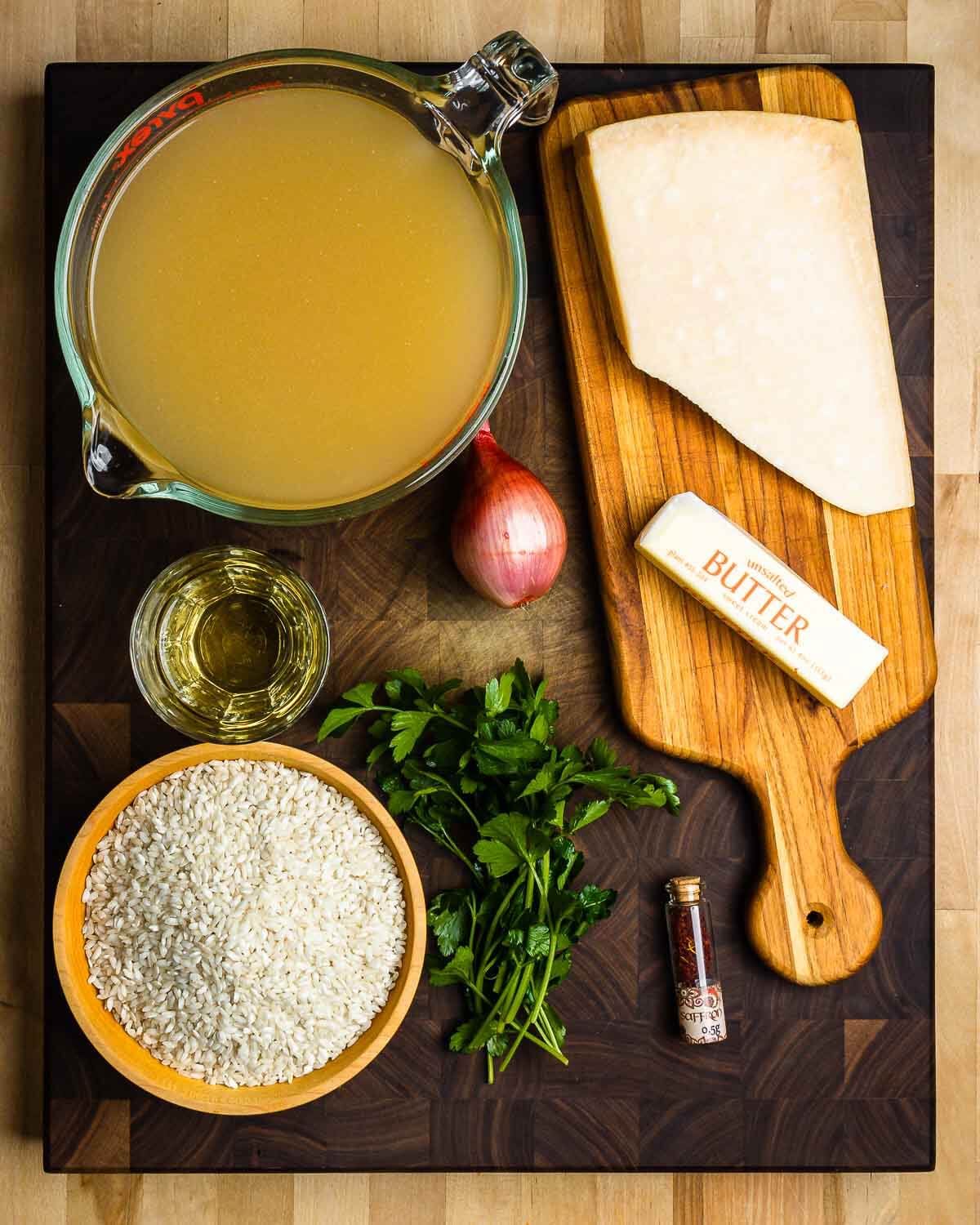 Ingredients shown: low-sodium chicken stock, Parmigiano Reggiano, shallot, white wine, butter, carnaroli rice, parsley, and saffron.
