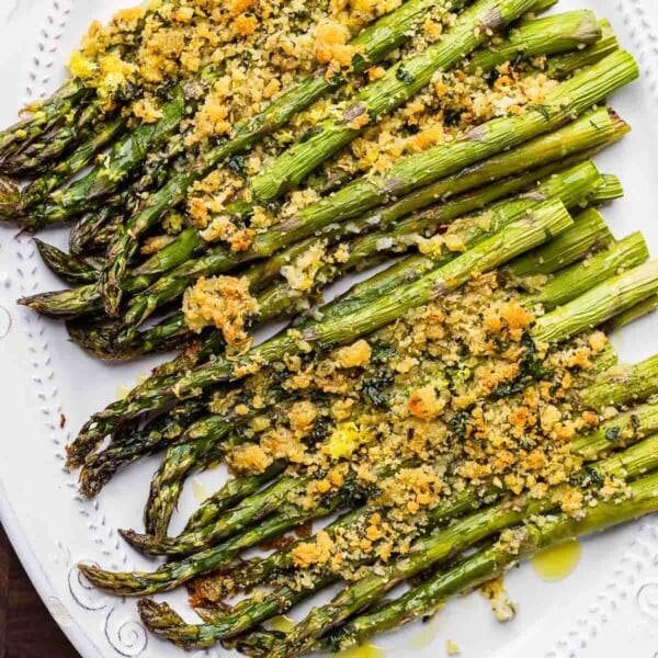 Baked asparagus with cheese and breadcrumbs featured image.