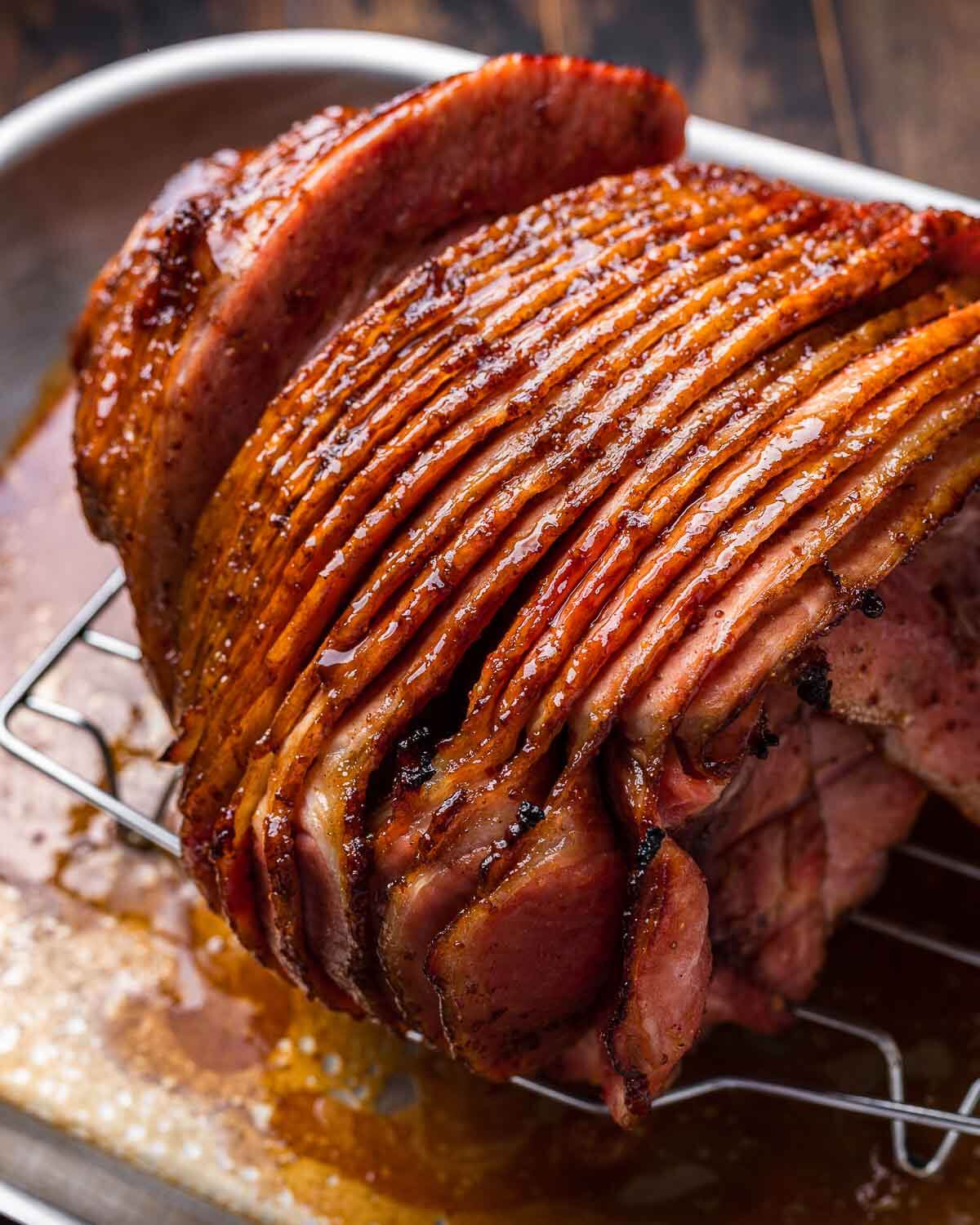 Closeup shot of spiral ham with brown sugar glaze.