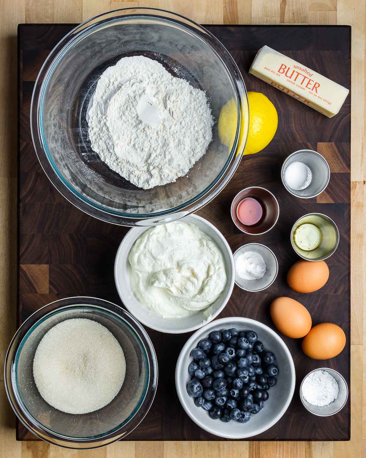 Overhead shot ingredients for lemon blueberry ricotta cake recipe.