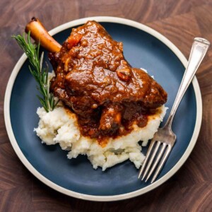 Red wine braised lamb shanks featured image.