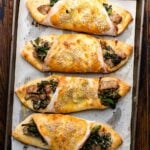 Sausage and broccoli rabe roll Pinterest image.