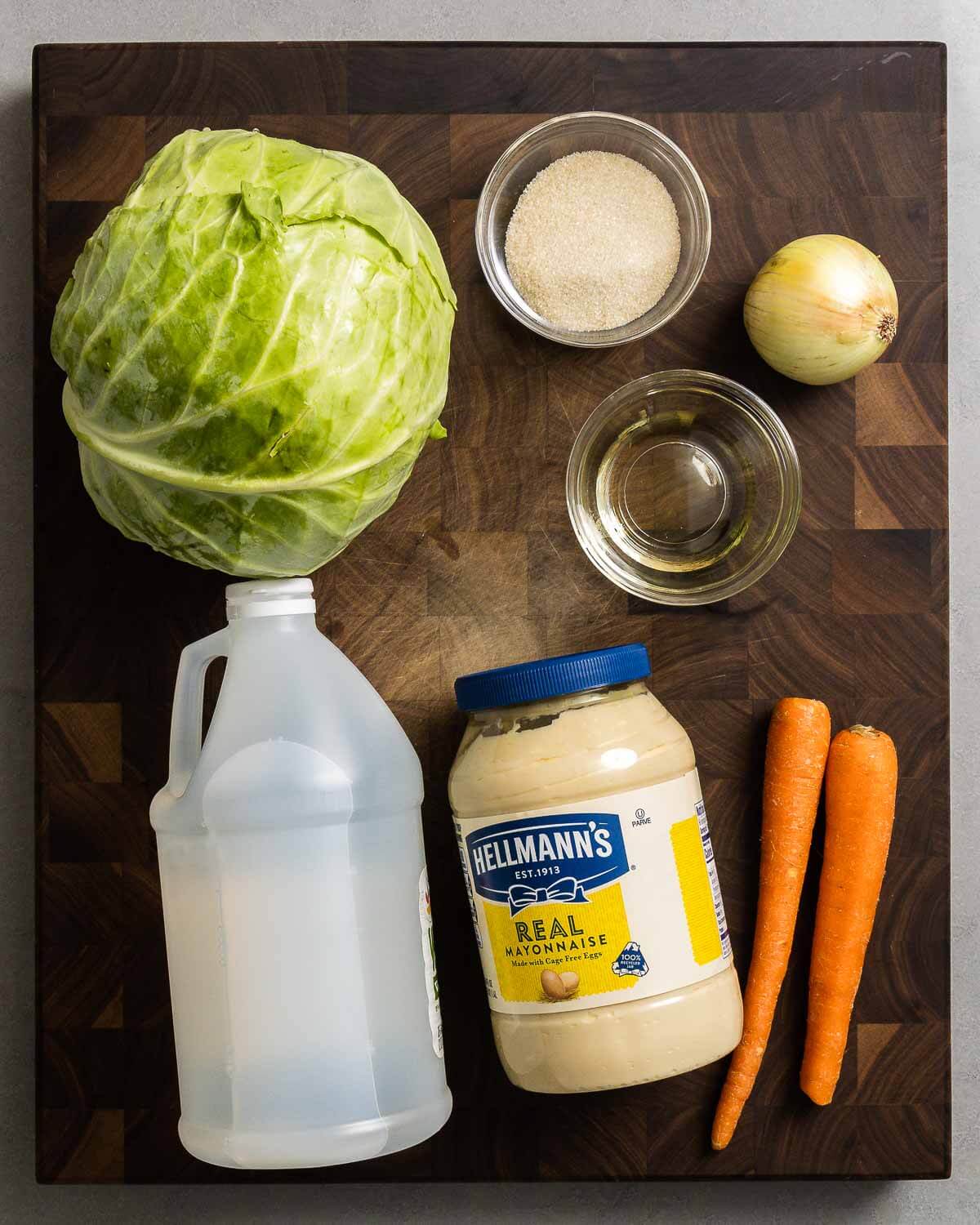 Ingredients shown: cabbage, sugar, vegetable oil, onion, vinegar, mayonnaise, and carrots.