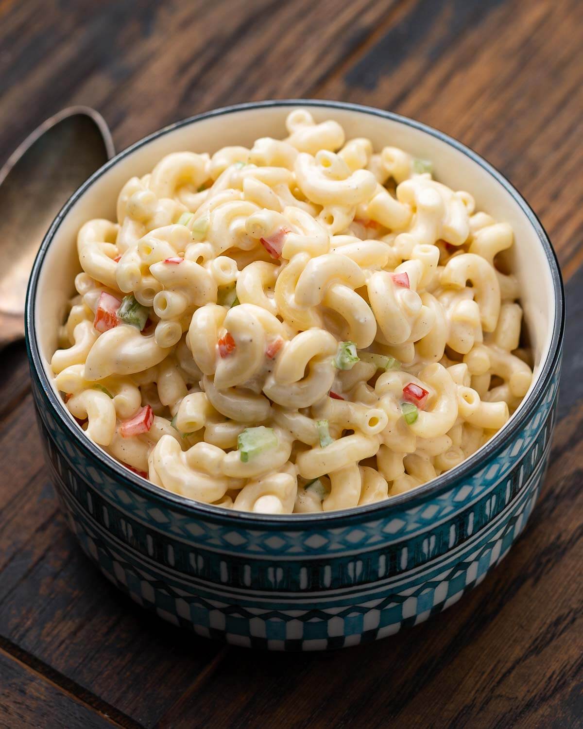 Blue bowl with deli style macaroni salad.