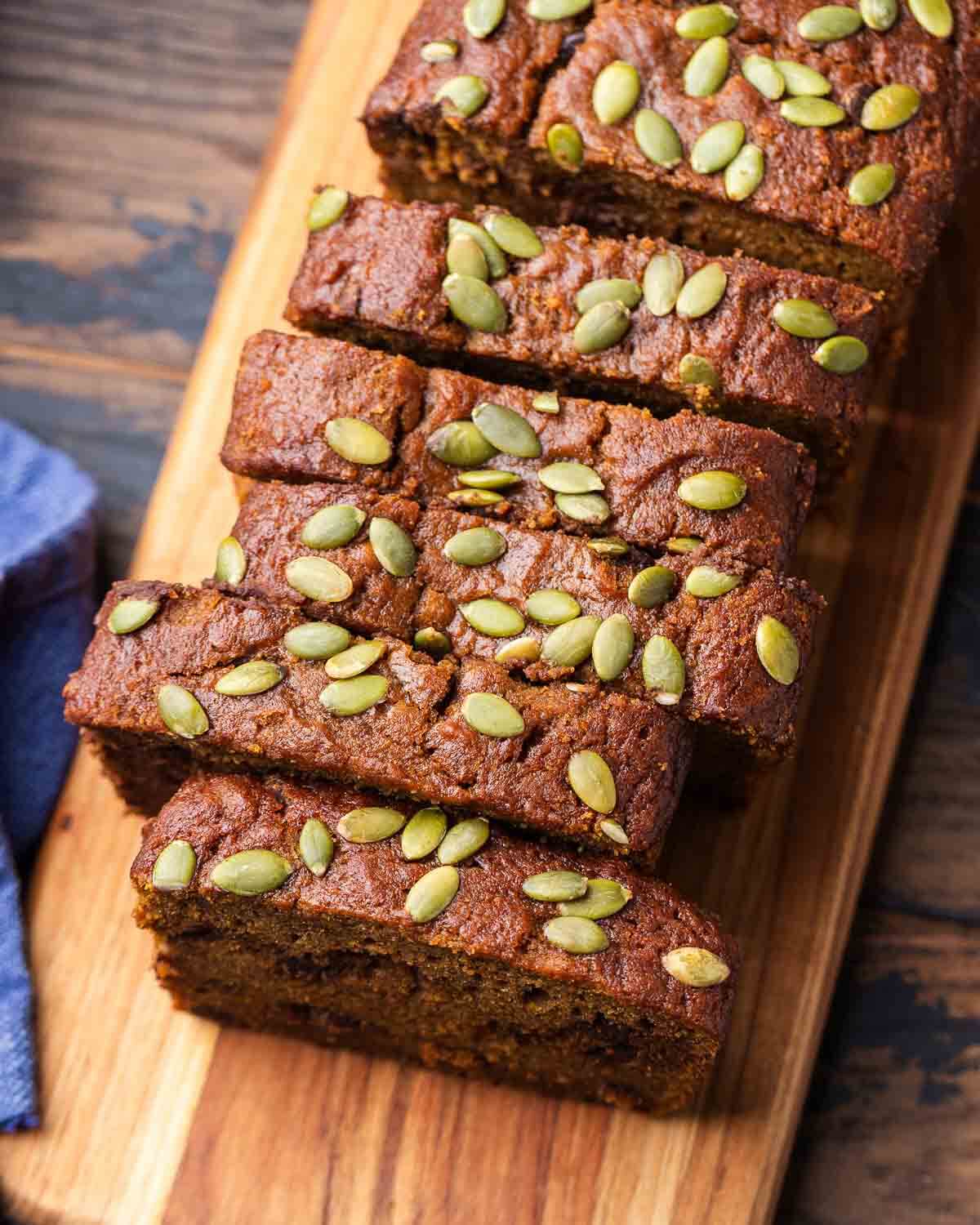 Overhead shot of chocolate chip pumpkin bread on cutting board.