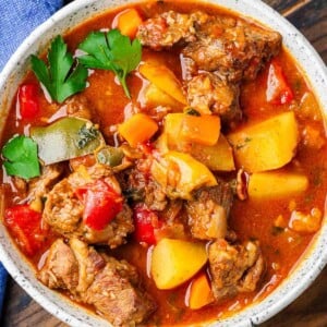 Featured image showing white bowl with Hungarian goulash.