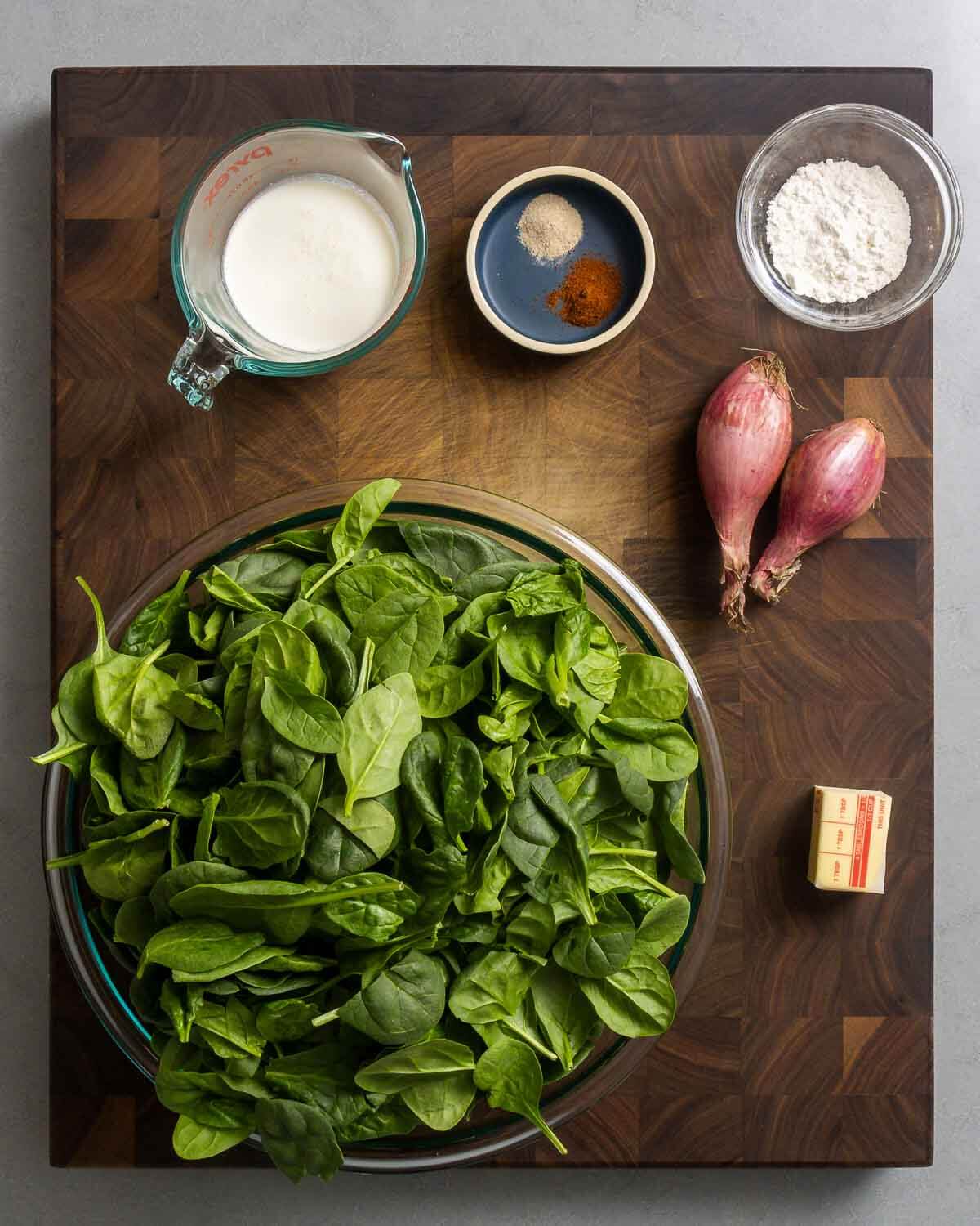 Ingredients shown: heavy cream, spices, flour, shallot, spinach, and butter.
