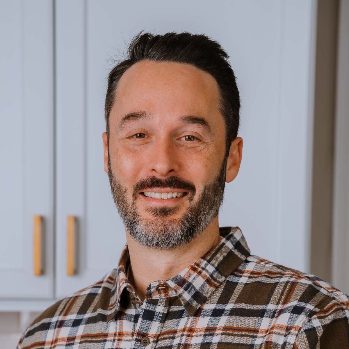 Headshot of Jim in kitchen.