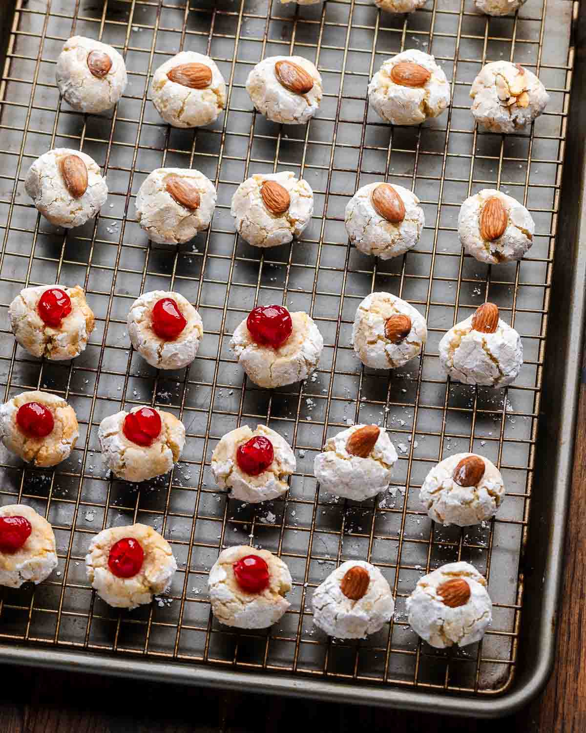 Wire rack with assorted Italian almond cookies.