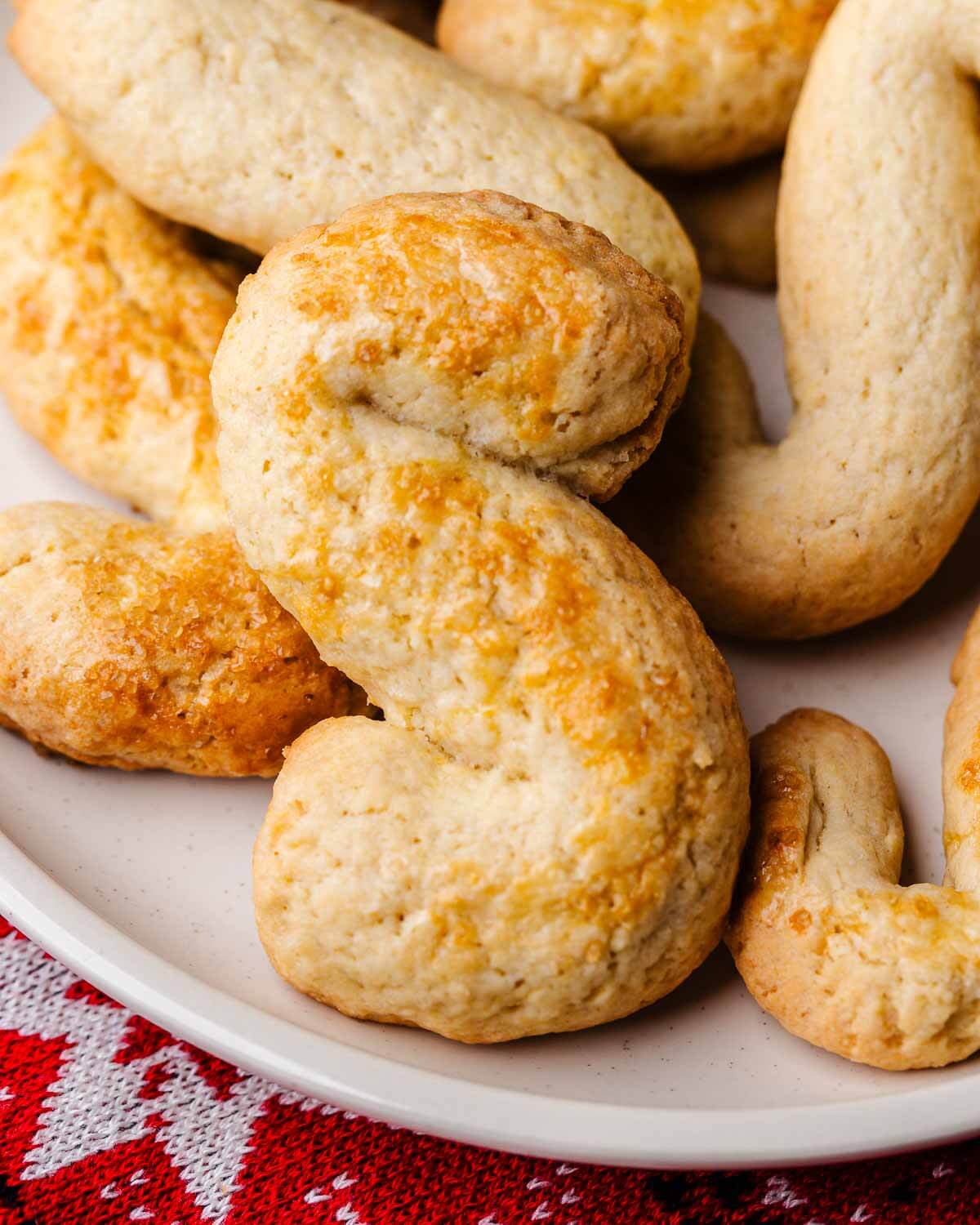 Closeup of an Italian s cookie in white plate.