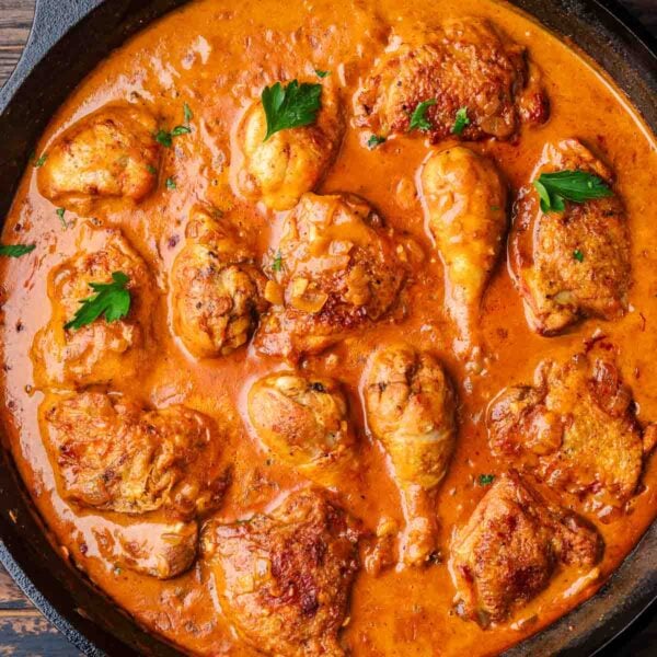 Chicken paprikash in cast iron pan for featured image.