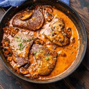 Steak Diane in black pan for featured image.