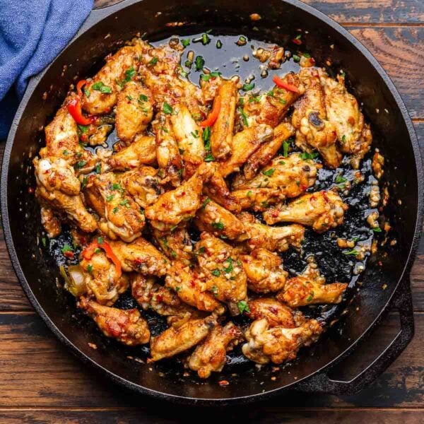 Scarpariello wings in cast iron pan for featured image.