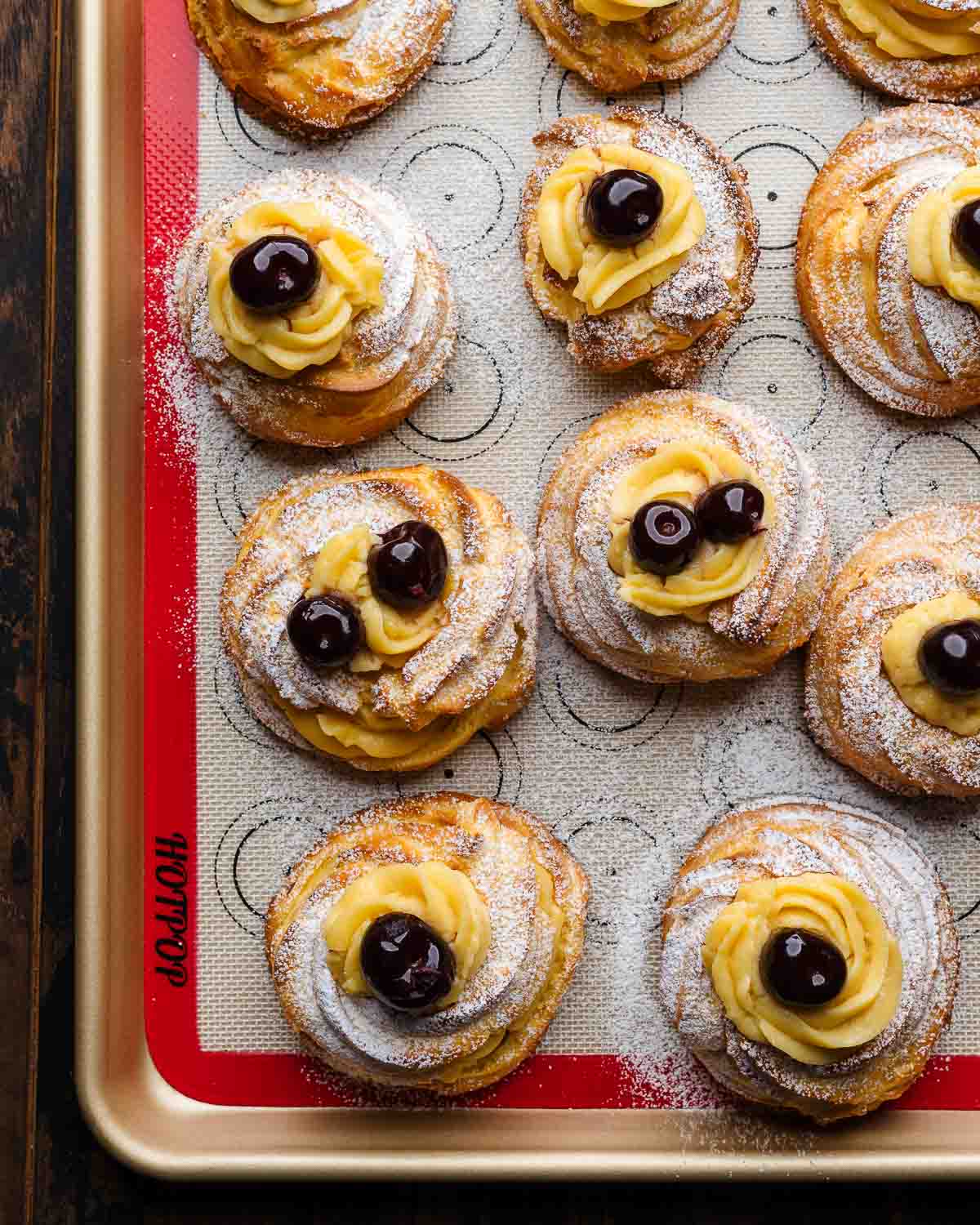 St. Josheph's Day Pastries on silicon lined baking sheet.