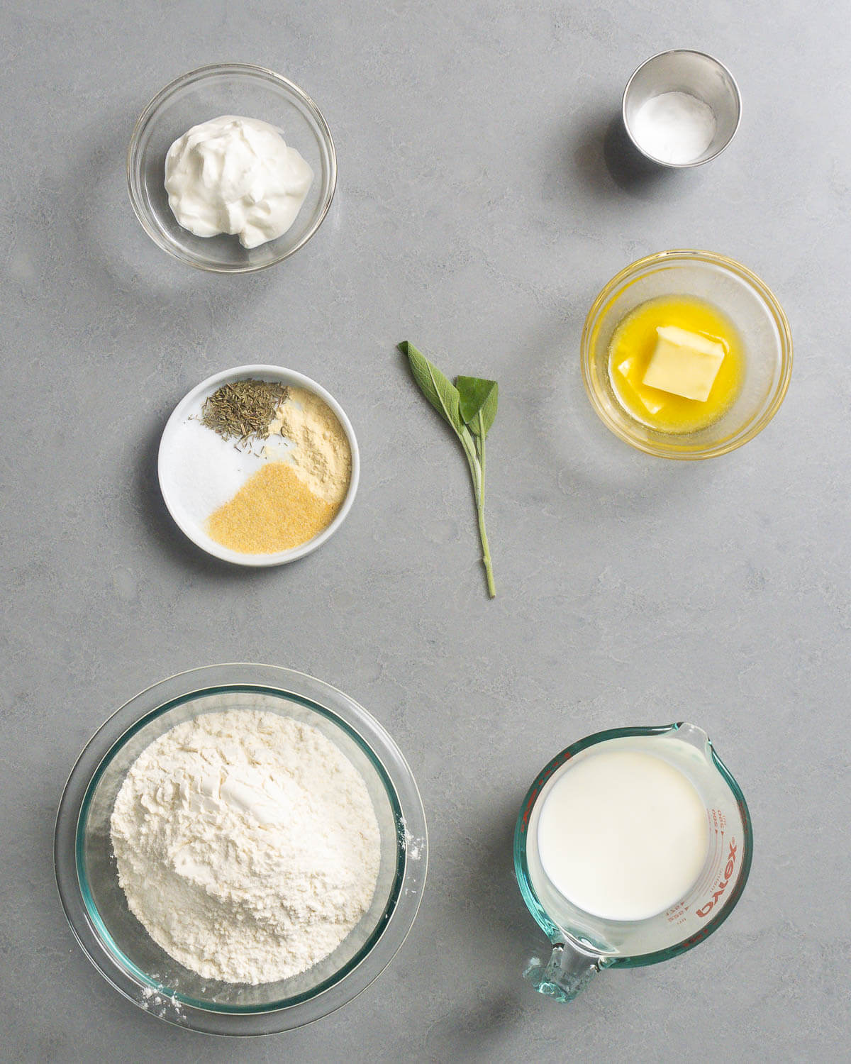 Dumpling ingredients shown: sour cream, baking powder, spices, sage, melted butter, cake flour, and milk.