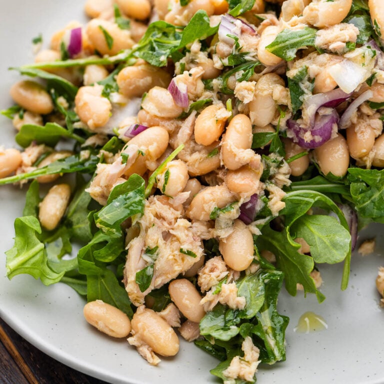 Italian tuna salad with white beans in plate.